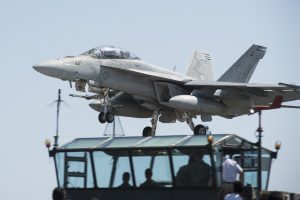 160511-N-BB269-074 IWO TO, Japan (May 11, 2016) An F/A-18E Super Hornet, attached to the Diamondbacks of Strike Fighter Squadron (VFA) 102, assigned to Carrier Air Wing (CVW) 5, practices a touch-and-go landing during field carrier landing practice at Iwo To, Japan. Formerly known as Iwo Jima, Iwo To is an island roughly 750 miles south of Tokyo used by CVW 5 to conduct yearly fighter pilot training and qualifications. (U.S. Navy photo by Mass Communication Specialist 2nd Class Raymond D. Diaz III/Released)